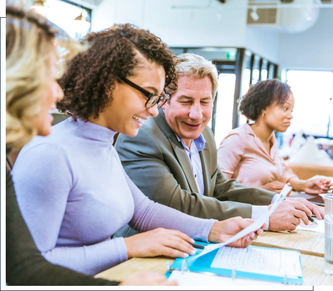 People collaborating in a meeting room